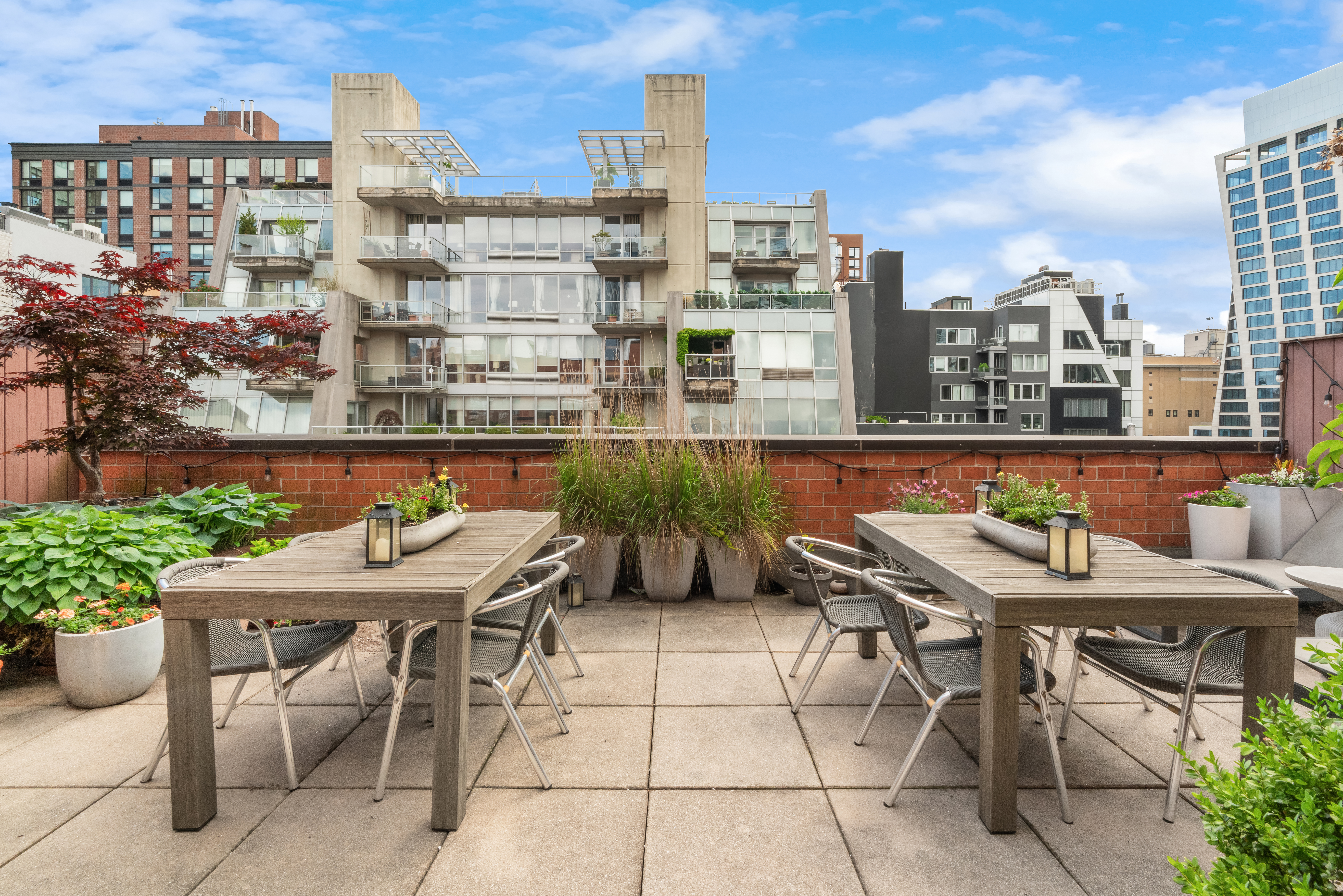 445 West 19th Street, Unit 6C Manhattan, NY 10011 - Photo 7 of 10 a view of a terrace with sitting area