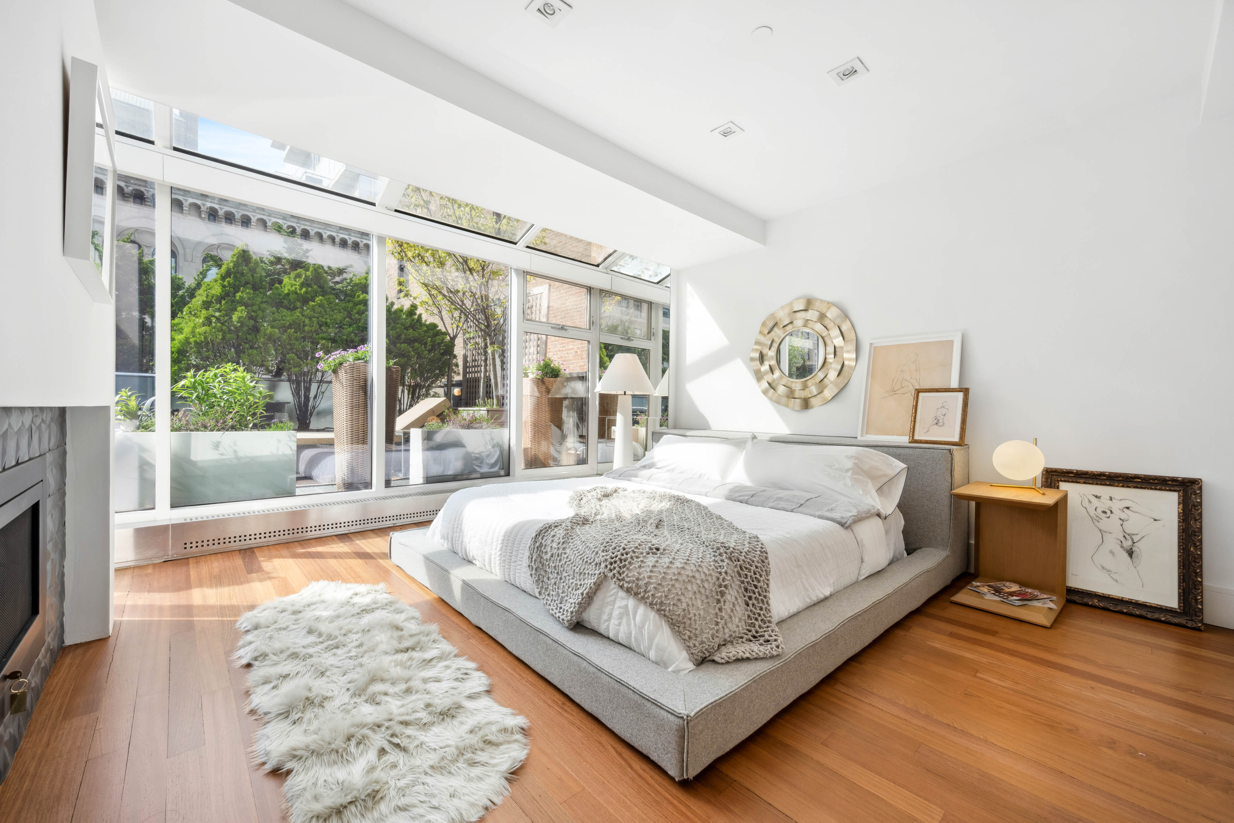 73 Worth Street, Unit PHA Manhattan, NY 10013 - Photo 8 of 20 a bedroom with a large bed and a large window