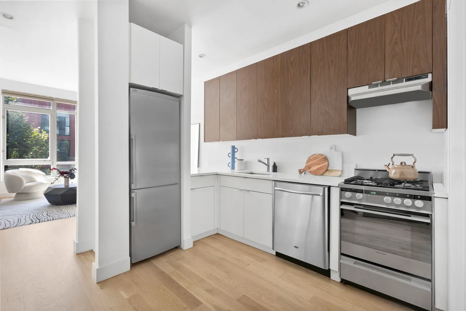 a kitchen with a stove and a refrigerator