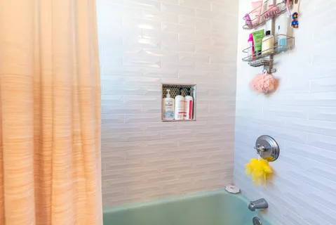 a bathroom with a sink and bathtub
