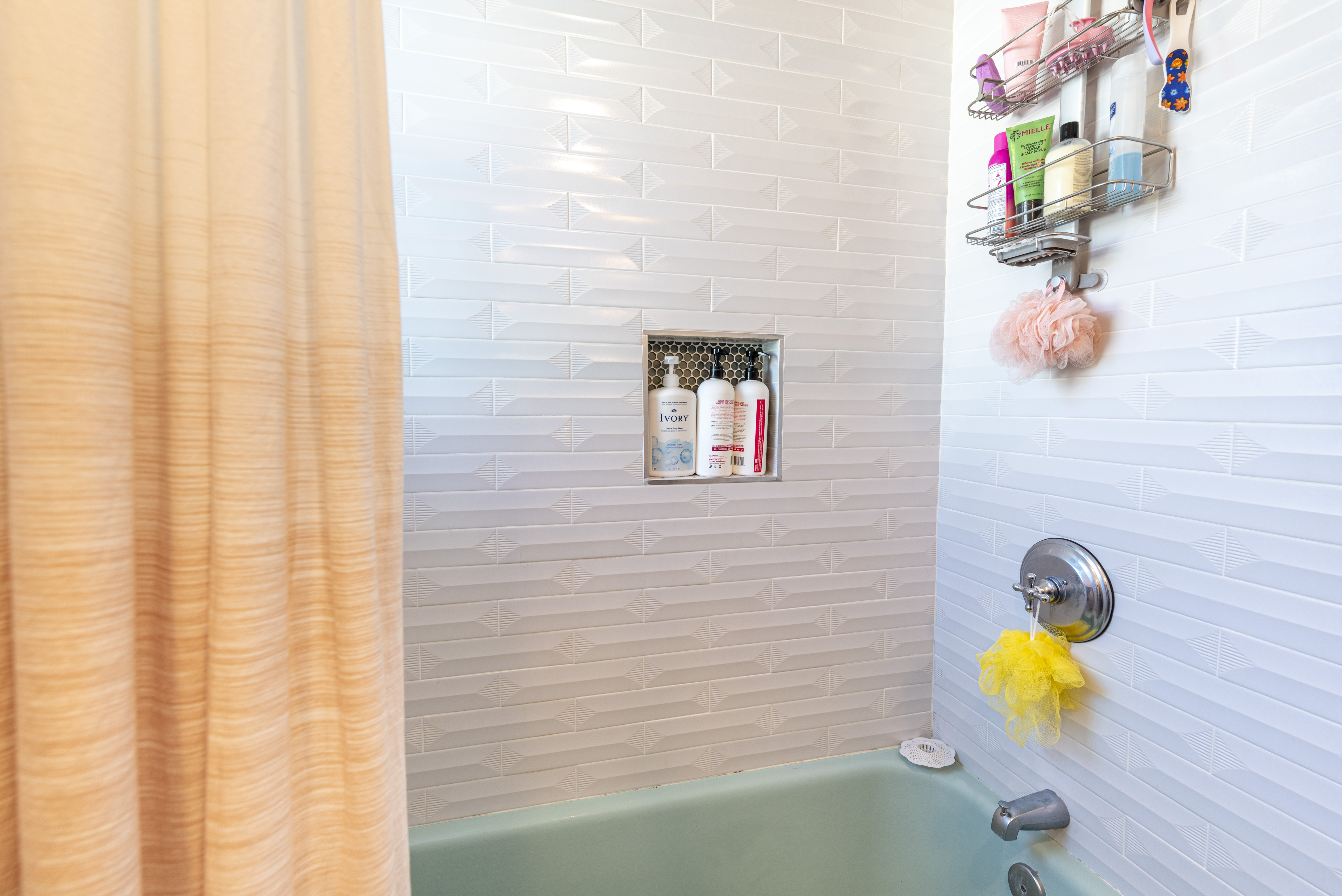 1005 Alexandria Avenue Los Angeles, CA 90029 - Photo 12 of 21 a bathroom with a sink and bathtub