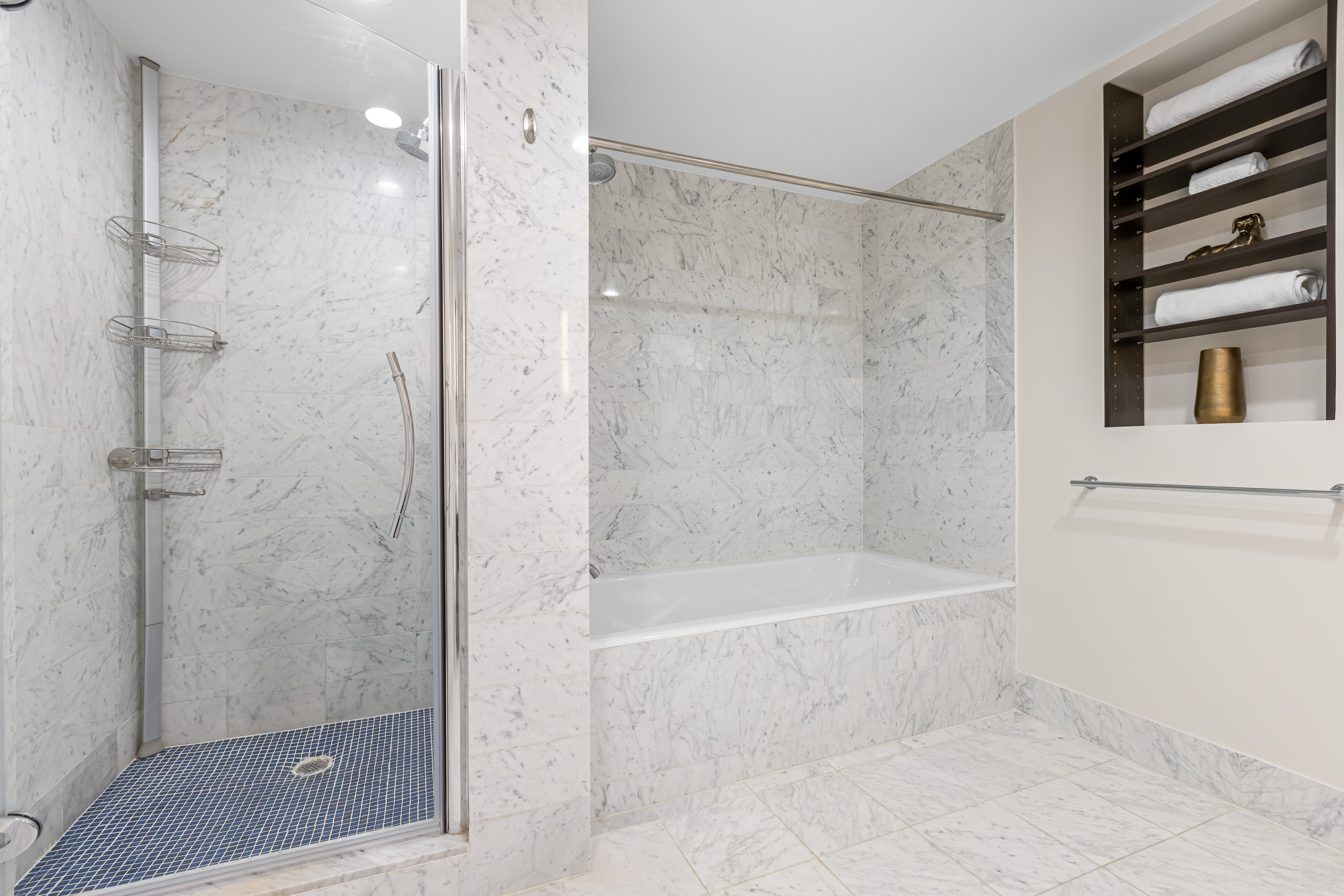 257 West 117th Street, Unit 6A Manhattan, NY 10026 - Photo 9 of 16 a bathroom with a bathtub and a shower