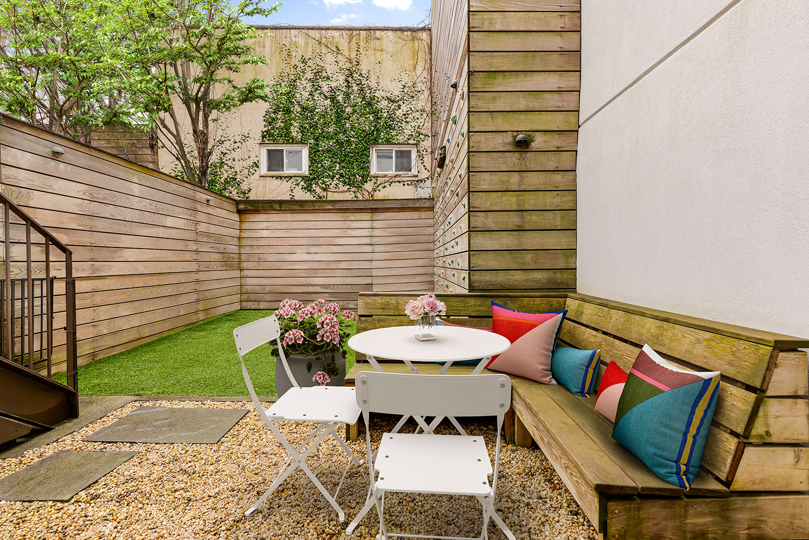 115 3rd Street, Unit 1 Brooklyn, NY 11231 - Photo 10 of 13 a backyard of a house with outdoor seating