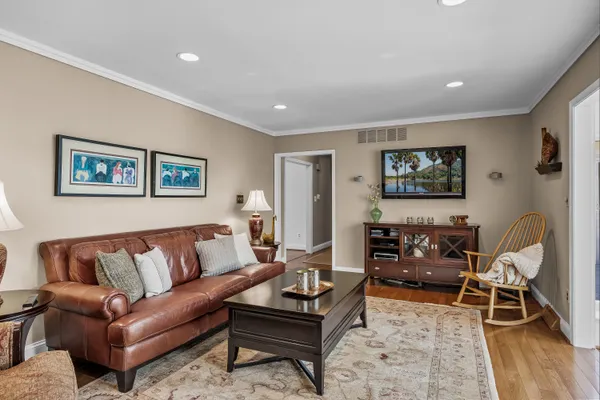 a kitchen with stainless steel appliances granite countertop a stove and a sink