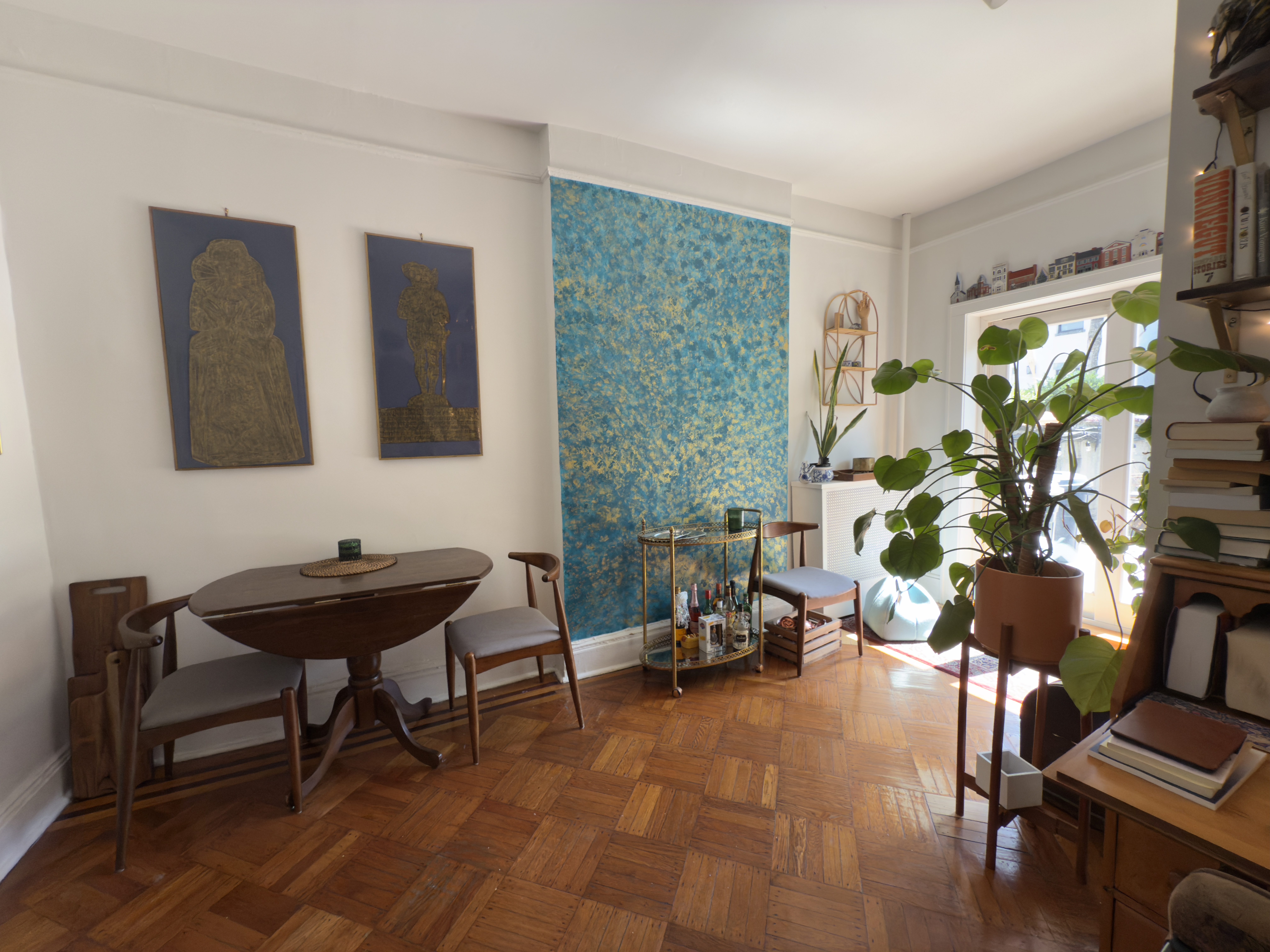 141 7th Avenue, Unit 1 Brooklyn, NY 11215 - Photo 3 of 16 a room with furniture and a potted plant