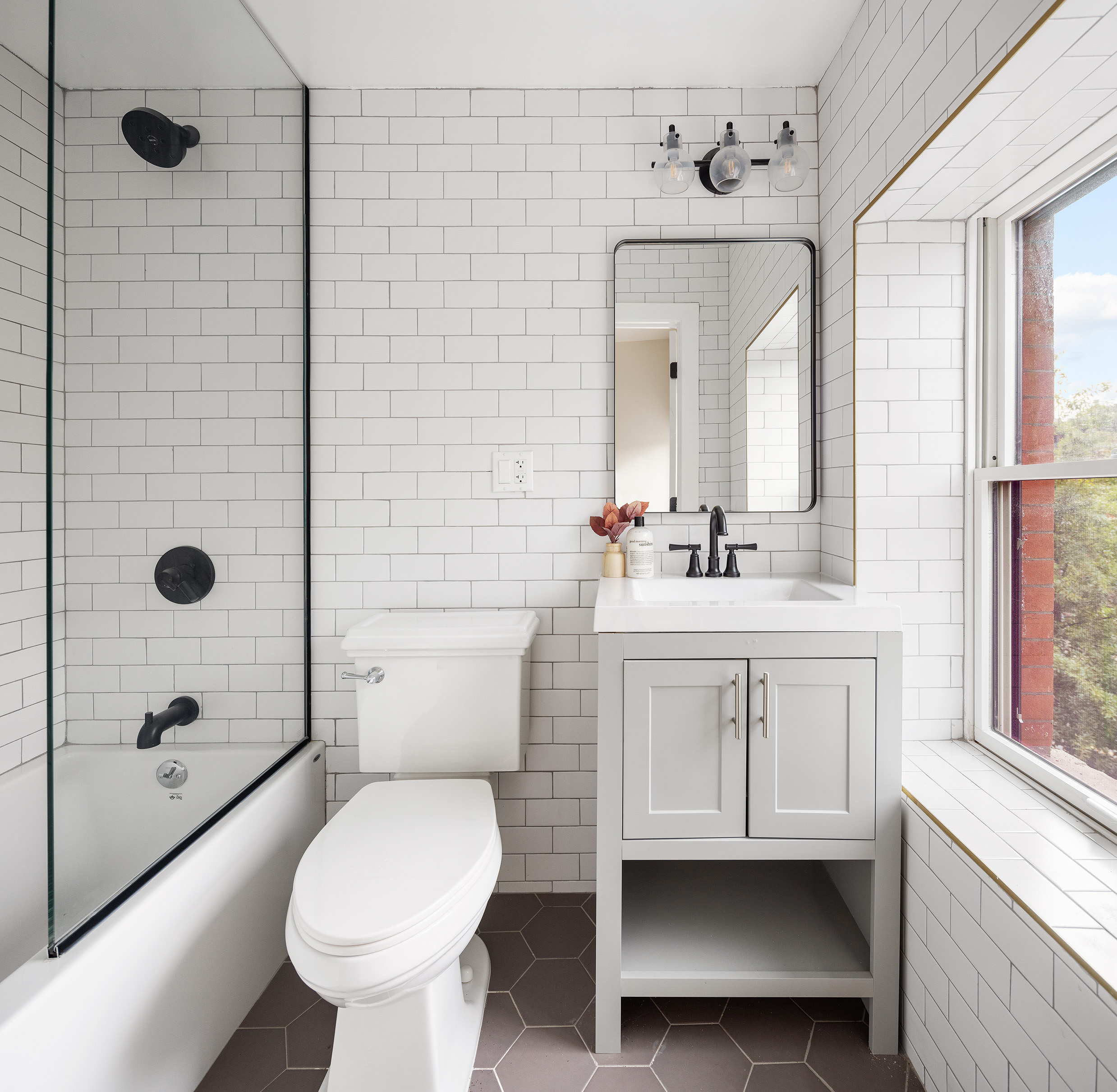 167 Putnam Avenue, Unit MF Brooklyn, NY 11216 - Photo 15 of 19 a bathroom with a toilet sink and shower