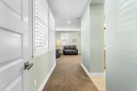 a bathroom with a sink vanity and mirror