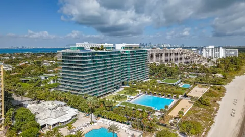 a kitchen with a sink and a refrigerator