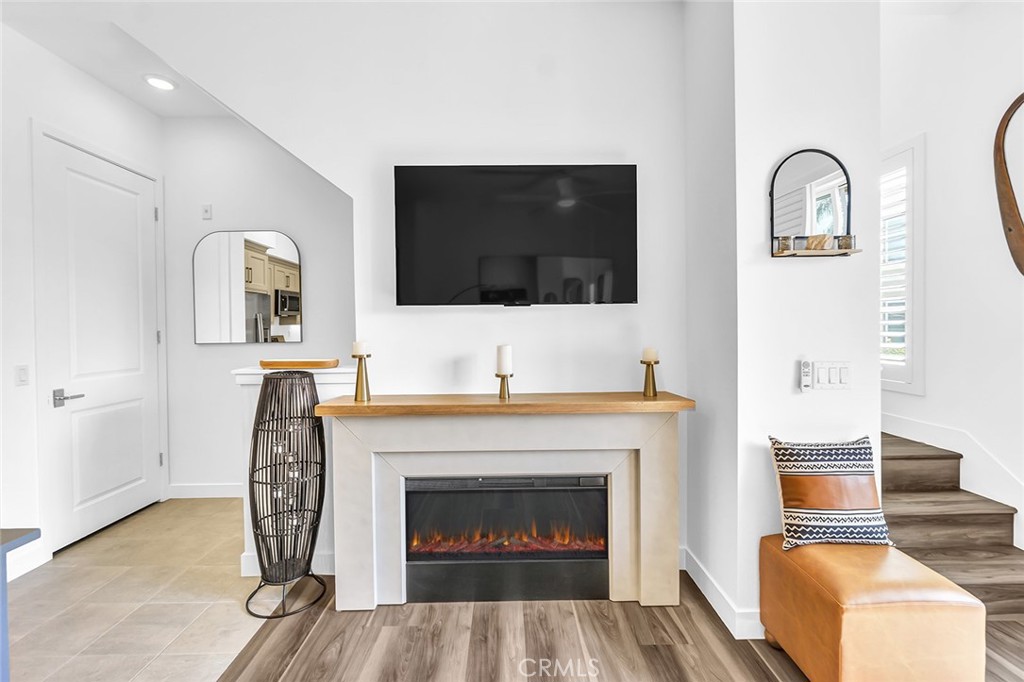 1632 Doheny Way Dana Point, CA 92629 - Photo 5 of 33 a living room with furniture and a fireplace