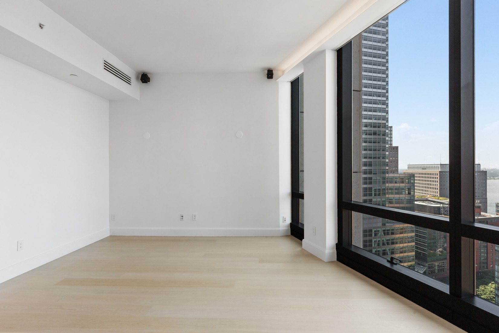 101 Warren Street, Unit 2420 Manhattan, NY 10007 - Photo 14 of 23 a view of a room with sliding door
