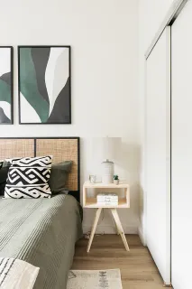 a bedroom with a bed and window