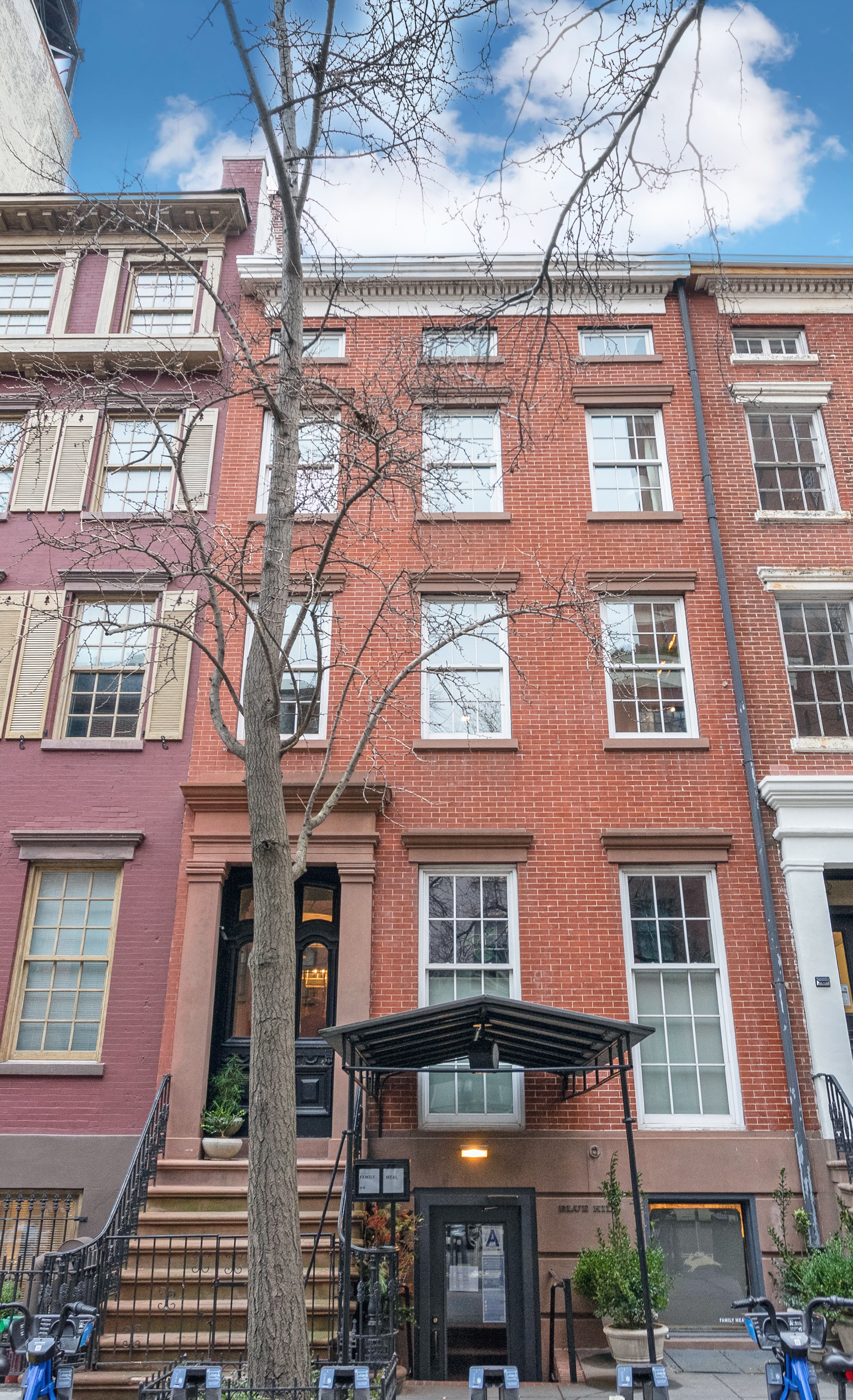 75 Washington Place, Unit TRIPLEX Manhattan, NY 10011 - Photo 2 of 14 a front view of a multi story residential apartment building