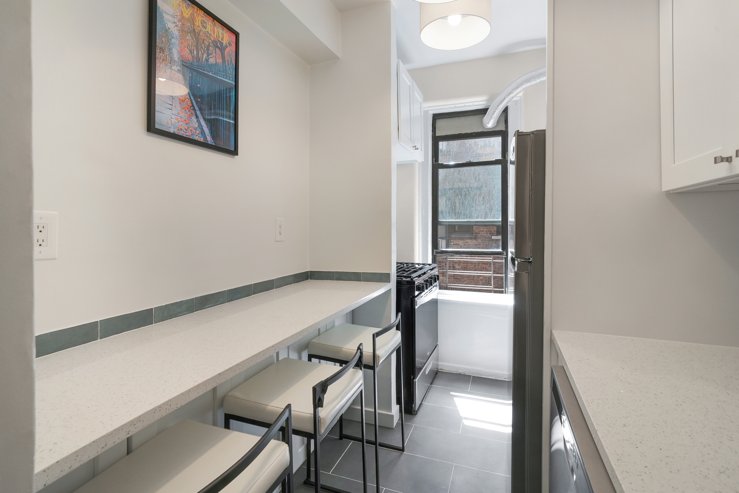200 West 109th Street, Unit C1 Manhattan, NY 10025 - Photo 4 of 16 a view of a hallway with furniture and floor to ceiling window