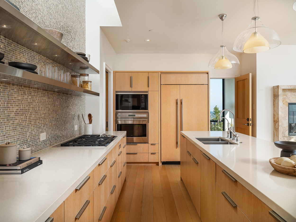 20 Crest Road Belvedere, CA 94920 - Photo 25 of 66 a kitchen with stainless steel appliances a sink stove and refrigerator