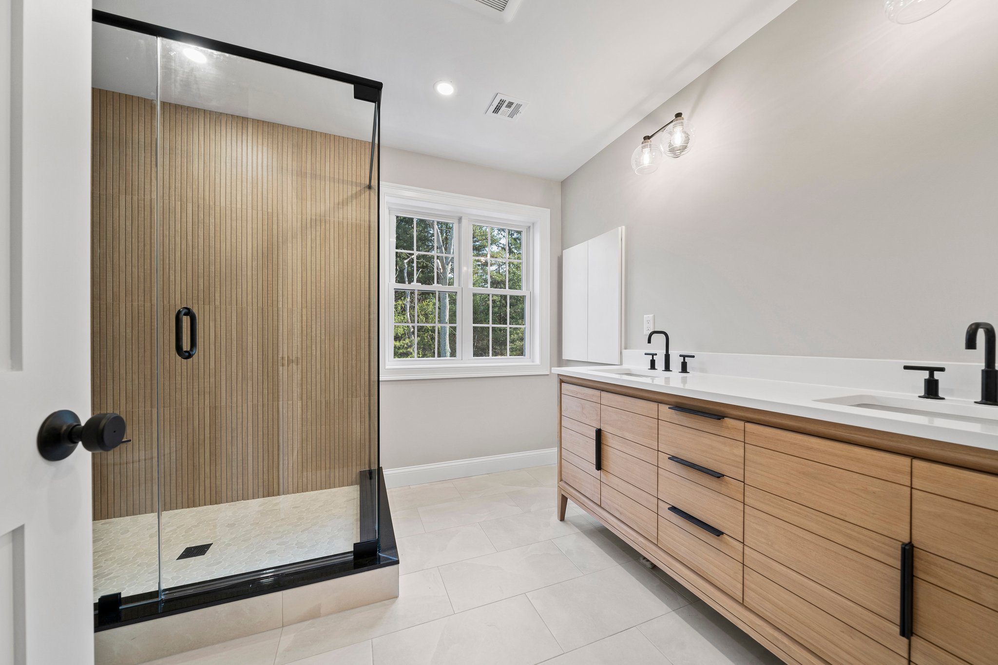 3 Everendon Road Canton, MA 02021 - Photo 22 of 35 a bathroom with a shower sink and mirror