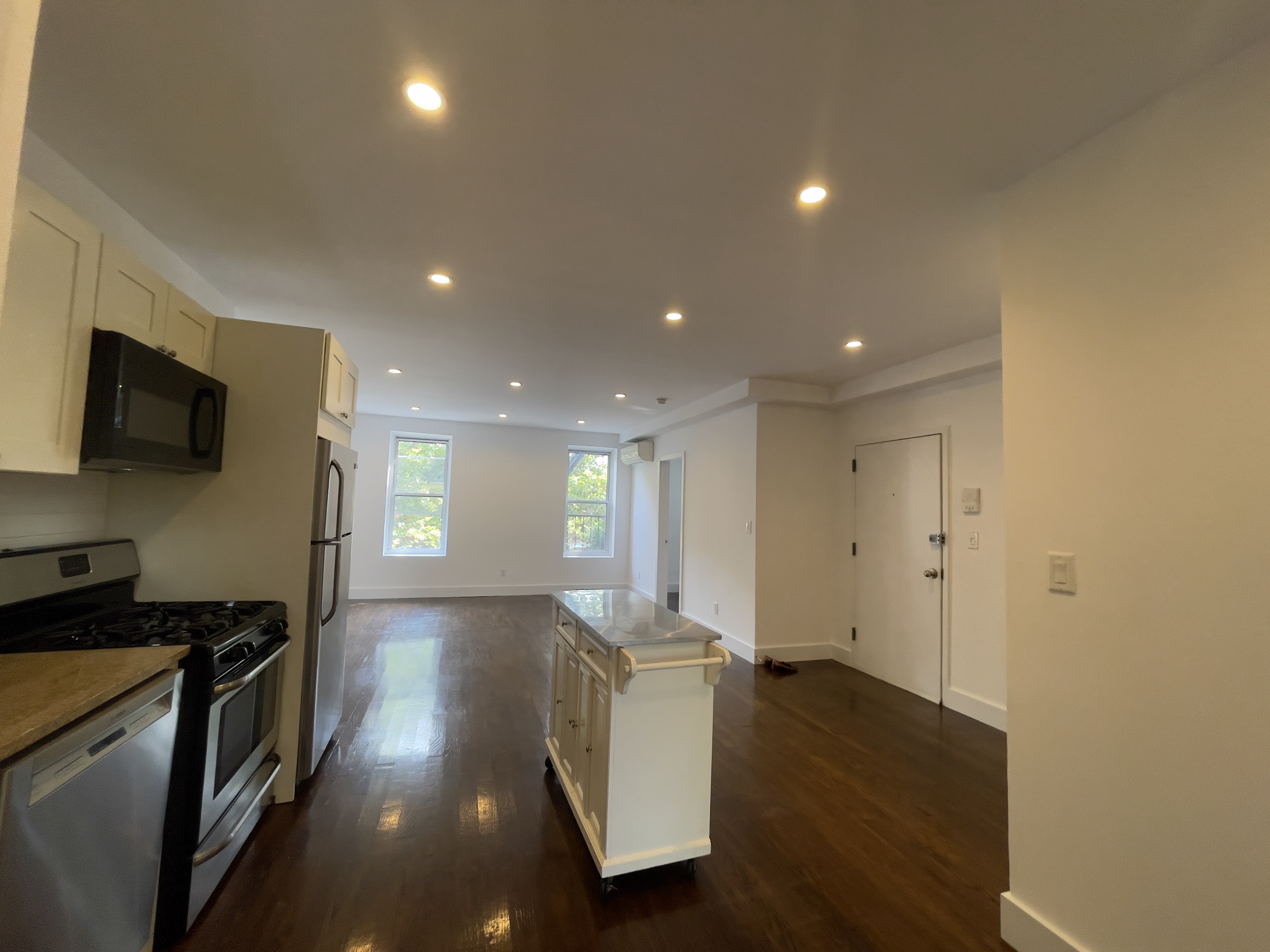 87 Douglass Street, Unit 2 Brooklyn, NY 11231 - Photo 5 of 16 a view of a kitchen with a sink and a refrigerator