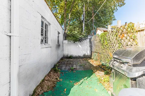 a picture of a park with a bench