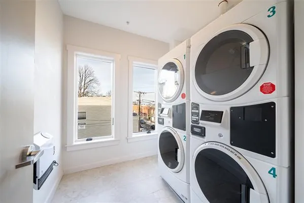a view of parking garage with cars
