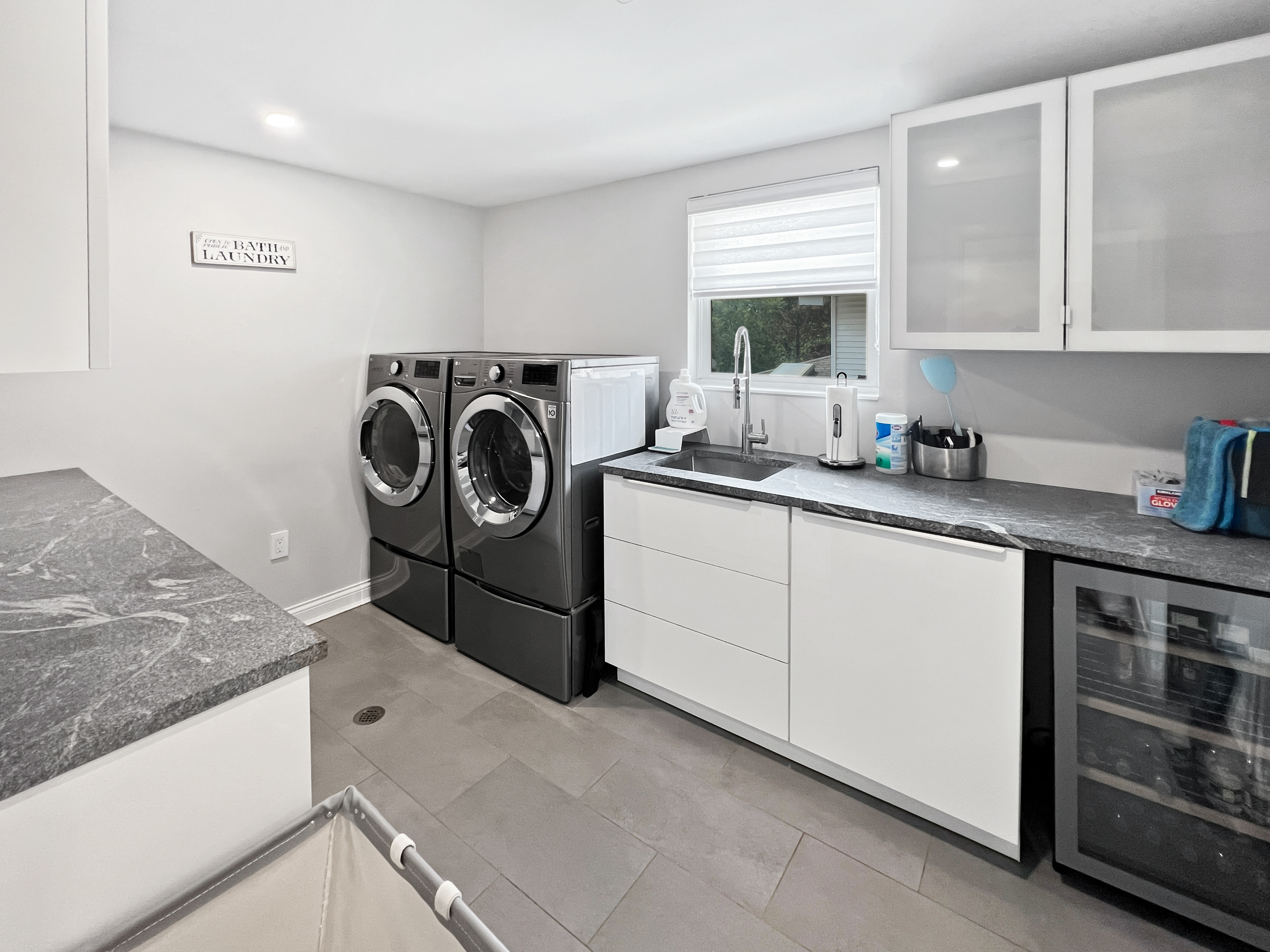 5021 Surf Avenue Brooklyn, NY 11224 - Photo 18 of 32 a utility room with sink dryer and washer