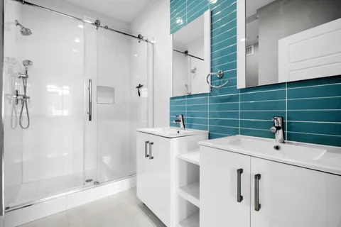 a bathroom with a sink and mirror