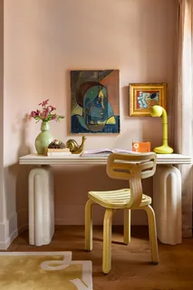 a bathroom with a sink vanity and mirror