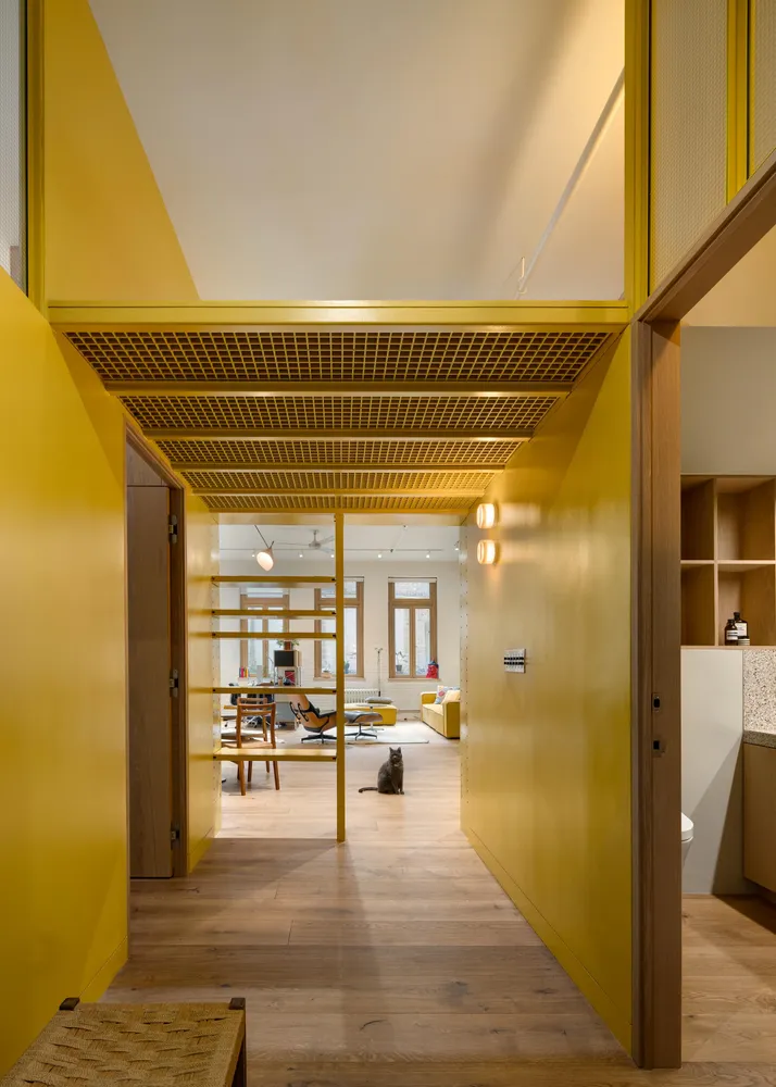 a bathroom with a bathtub and a shelf