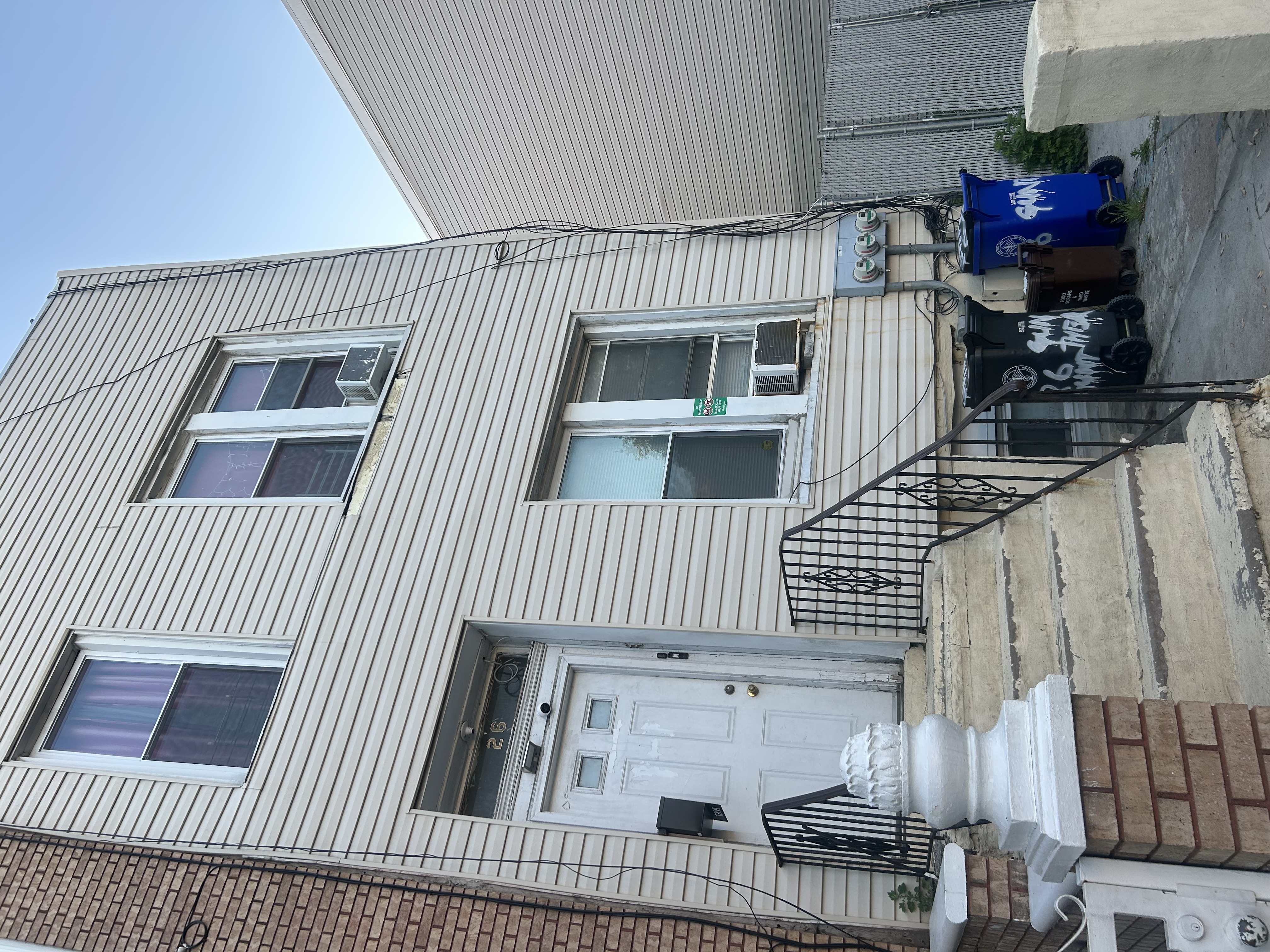 26 Gunther Place Brooklyn, NY 11233 - Photo 3 of 3 a view of a house with wooden fence