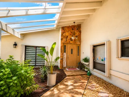 a house view with a outdoor space