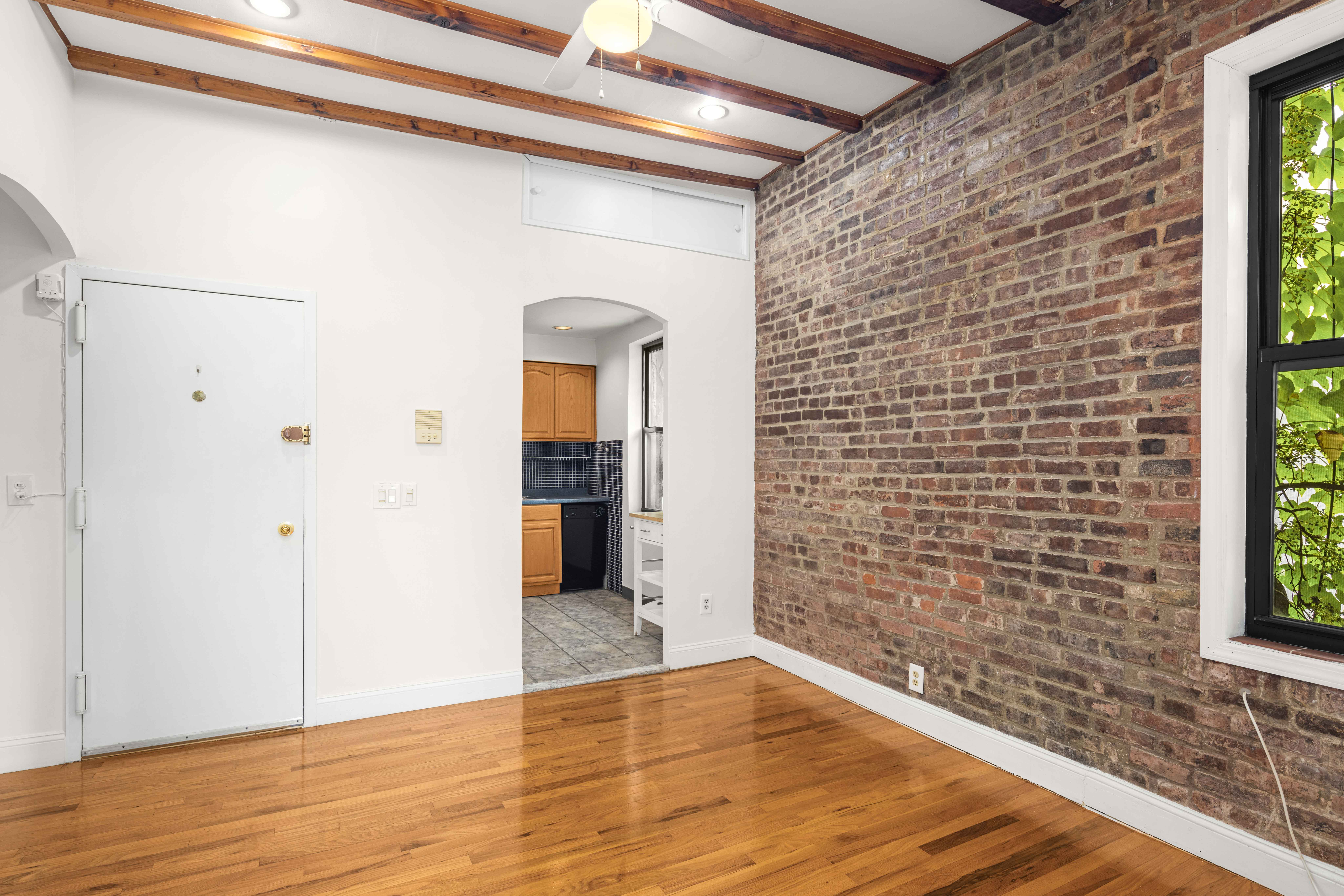 120 Suffolk Street, Unit 5B Manhattan, NY 10002 - Photo 5 of 14 a view of an empty room