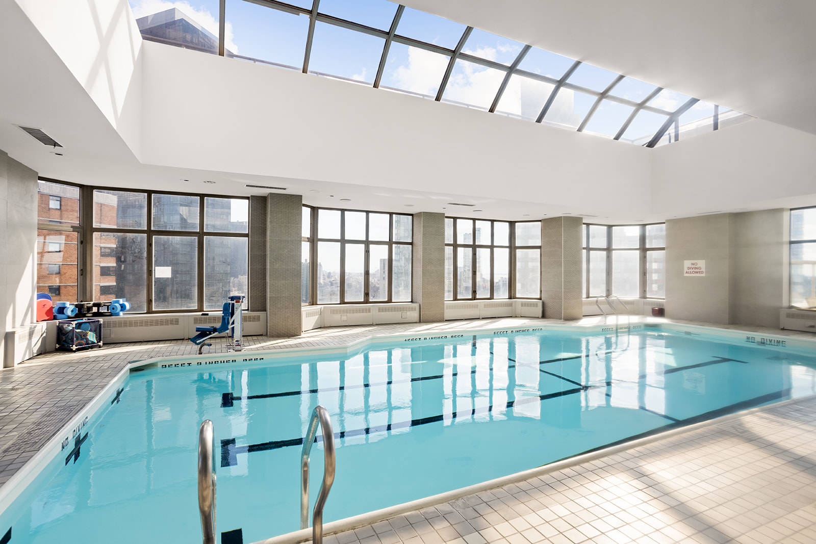 500 West 43rd Street, Unit 3B Manhattan, NY 10036 - Photo 14 of 19 a large white kitchen with a large window