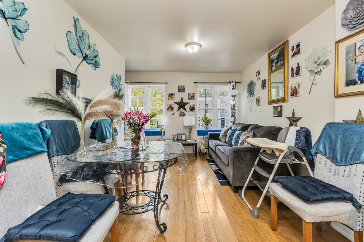 539 Quincy Street Brooklyn, NY 11221 - Photo 3 of 15 a view of a dining room with furniture and wooden floor