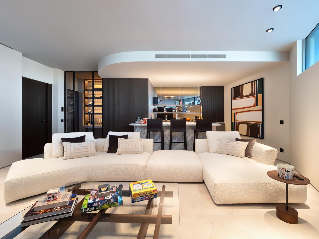 Private Address Andratx, Mallorca Spain, IB 07157 - Photo 15 of 17 a living room with furniture and a lamp