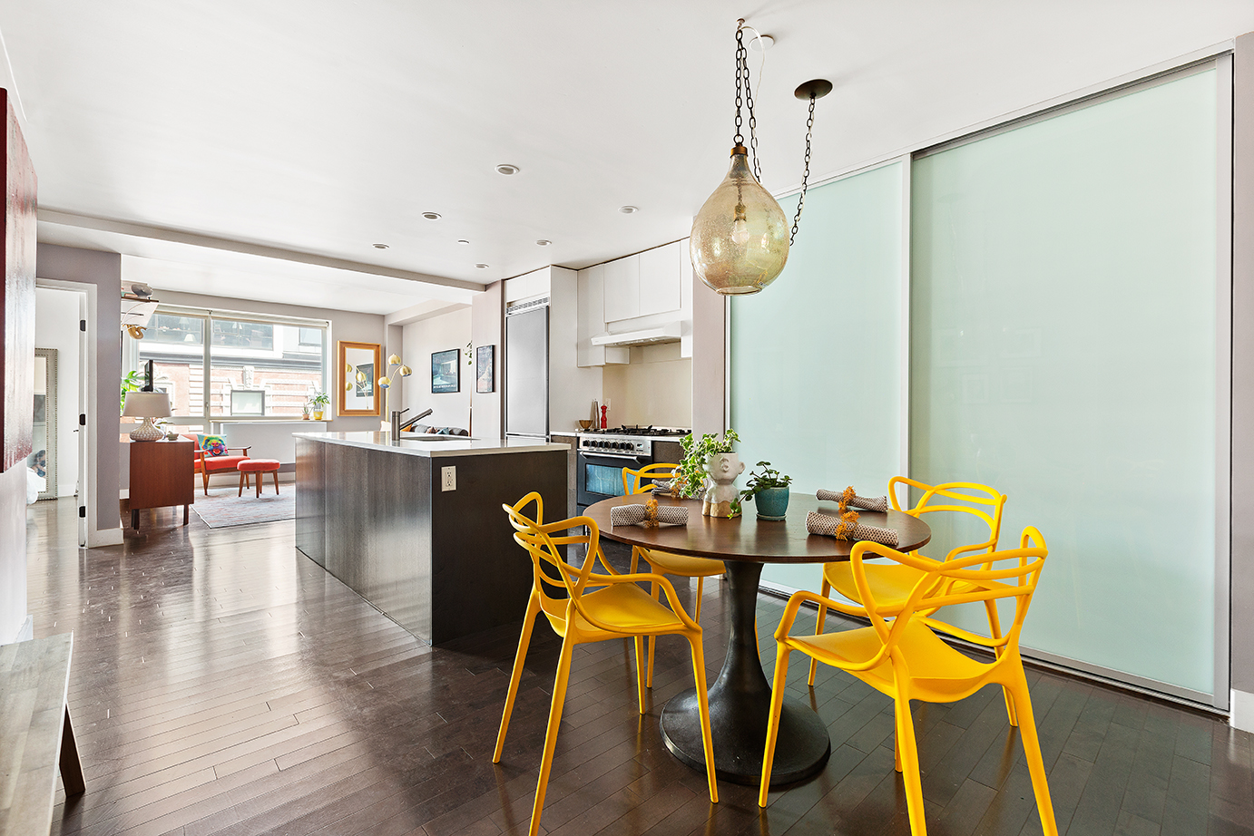 88 Morningside Avenue, Unit 8E Manhattan, NY 10027 - Photo 3 of 7 a view of a dining room with furniture and wooden floor