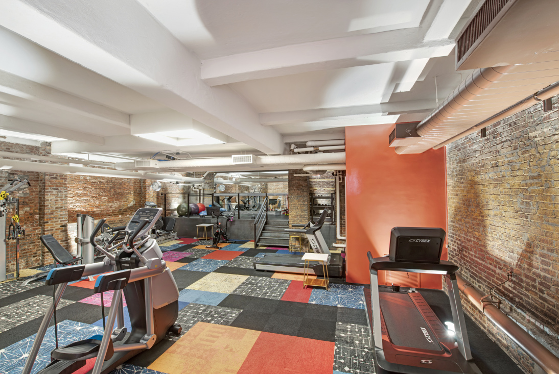 308 East 79th Street, Unit 13EF Manhattan, NY 10075 - Photo 13 of 16 a view of a room with gym equipment