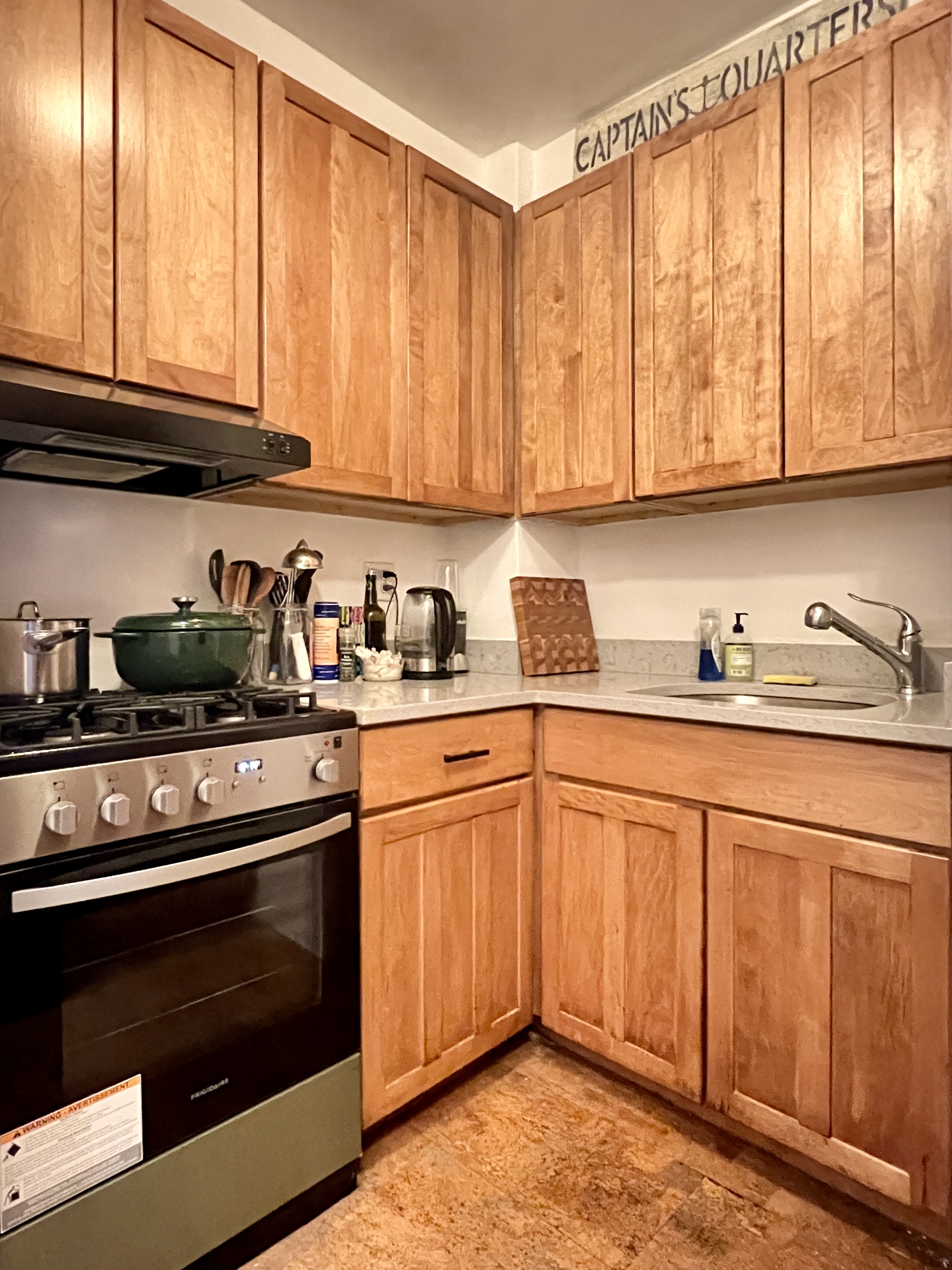 101 Lafayette Avenue, Unit 12L Brooklyn, NY 11217 - Photo 5 of 7 a kitchen with granite countertop cabinets stainless steel appliances granite counter tops and a window