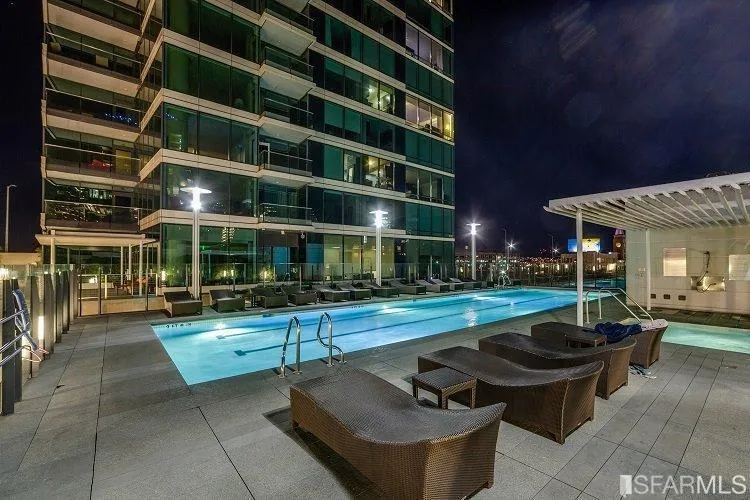 a view of pool with outdoor seating