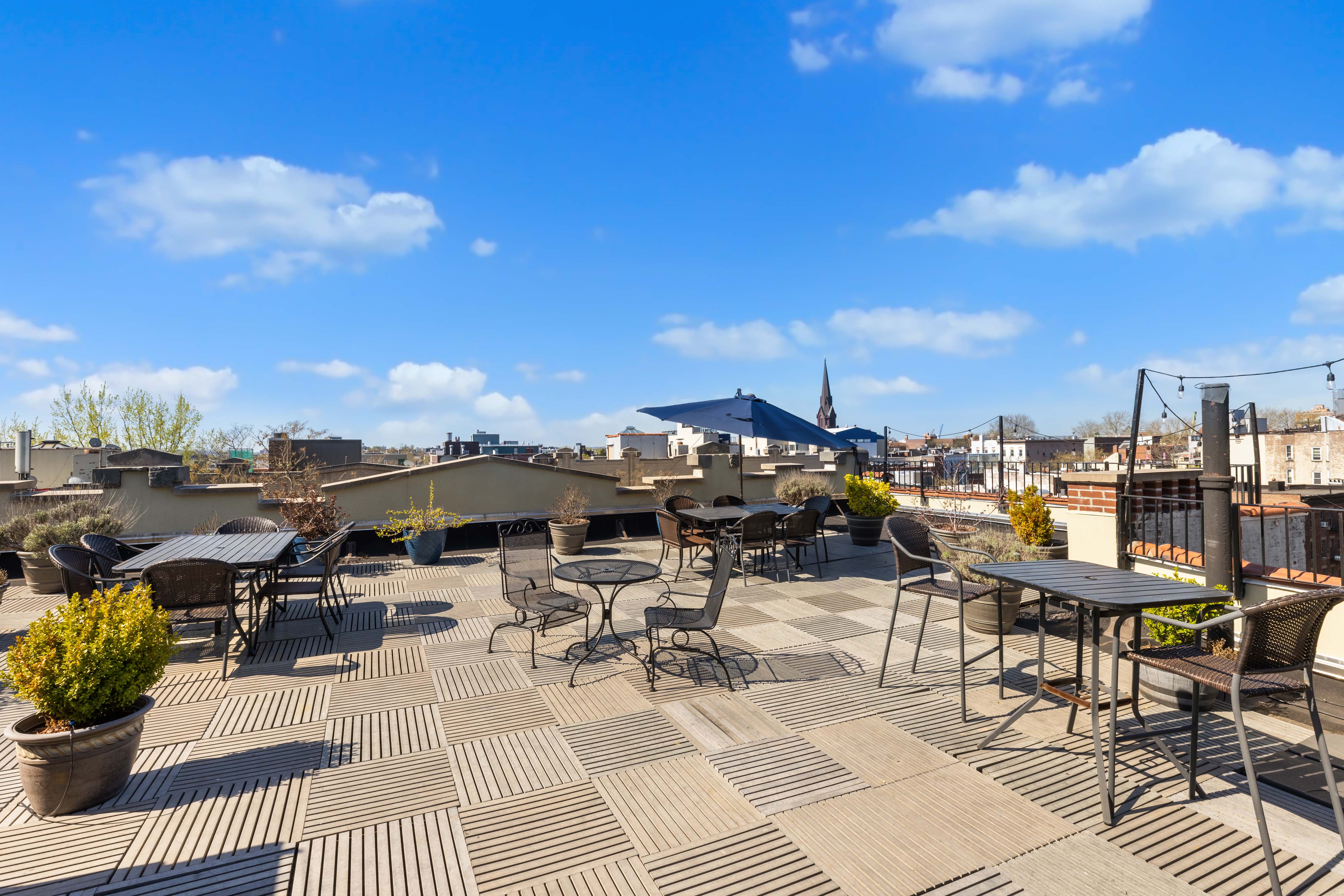 251 Pacific Street, Unit 8 Brooklyn, NY 11201 - Photo 6 of 9 a view of a terrace with furniture