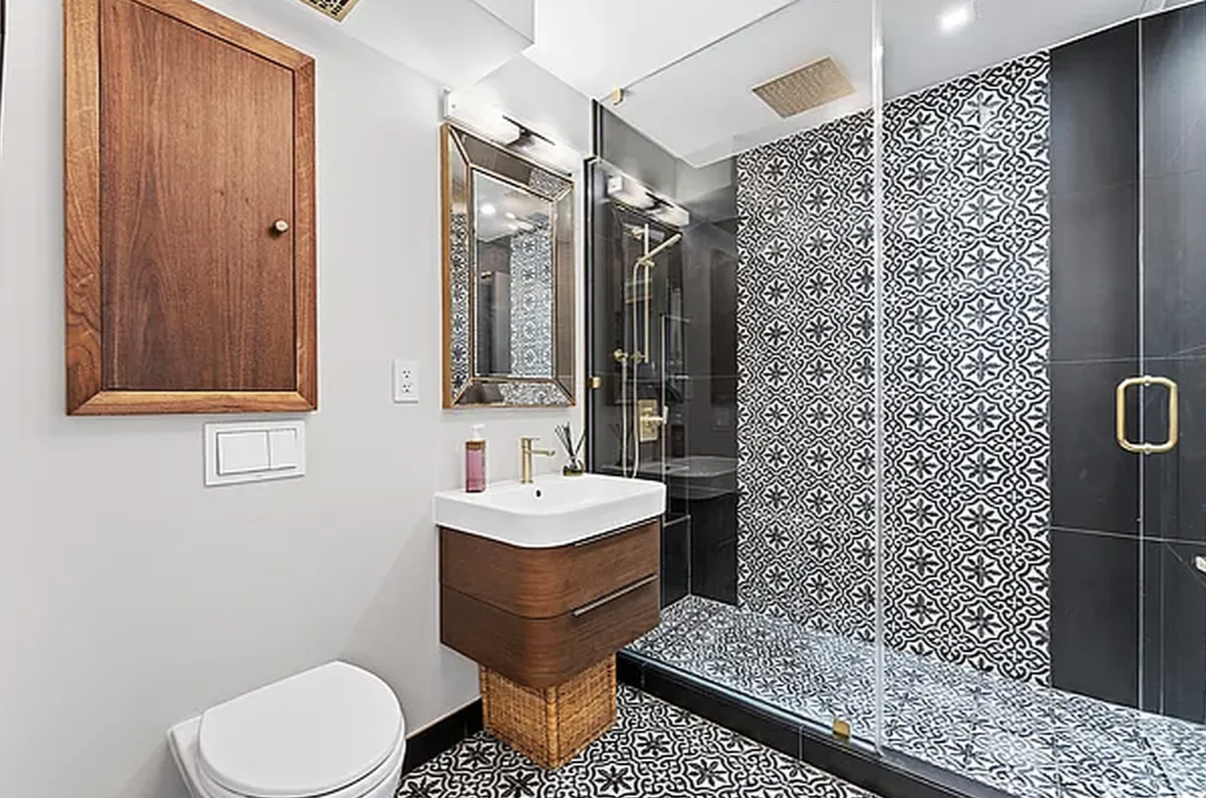 32 Gramercy Park South, Unit 12DG Manhattan, NY 10003 - Photo 5 of 11 a bathroom with a toilet a sink and mirror