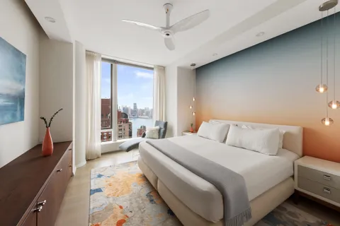 a bed room with a bed and a couch