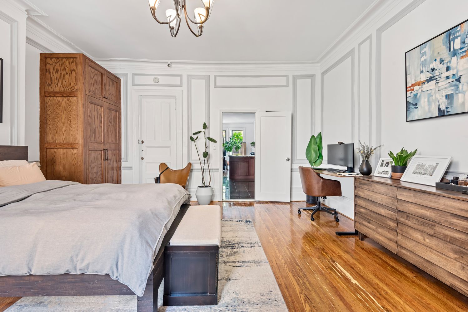 a bed room with a bed and furniture