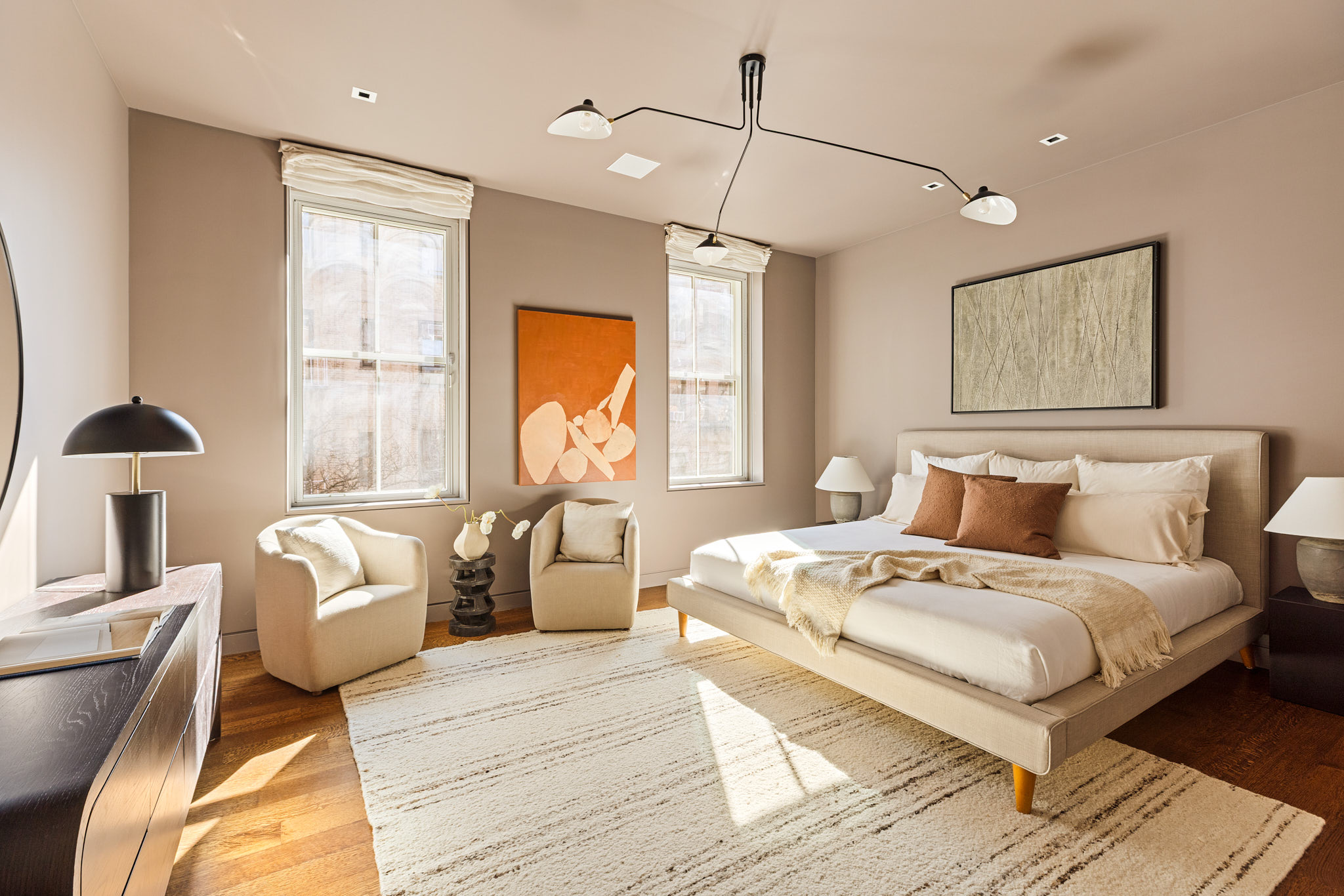 34 Prince Street, Unit 3B Manhattan, NY 10012 - Photo 6 of 18 a bedroom with a large bed and a window