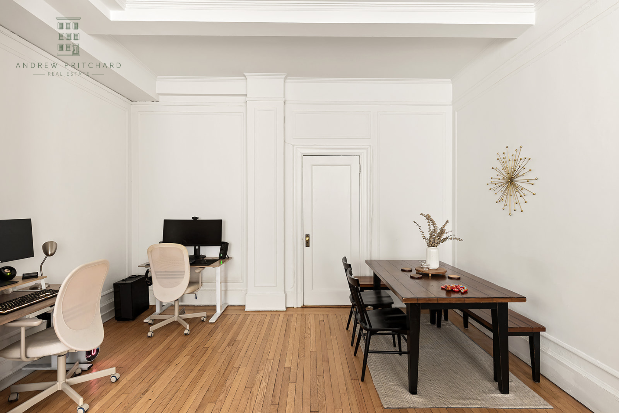 212 East 48th Street, Unit 1D Manhattan, NY 10017 - Photo 4 of 12 a view of a workspace with furniture and wooden floor
