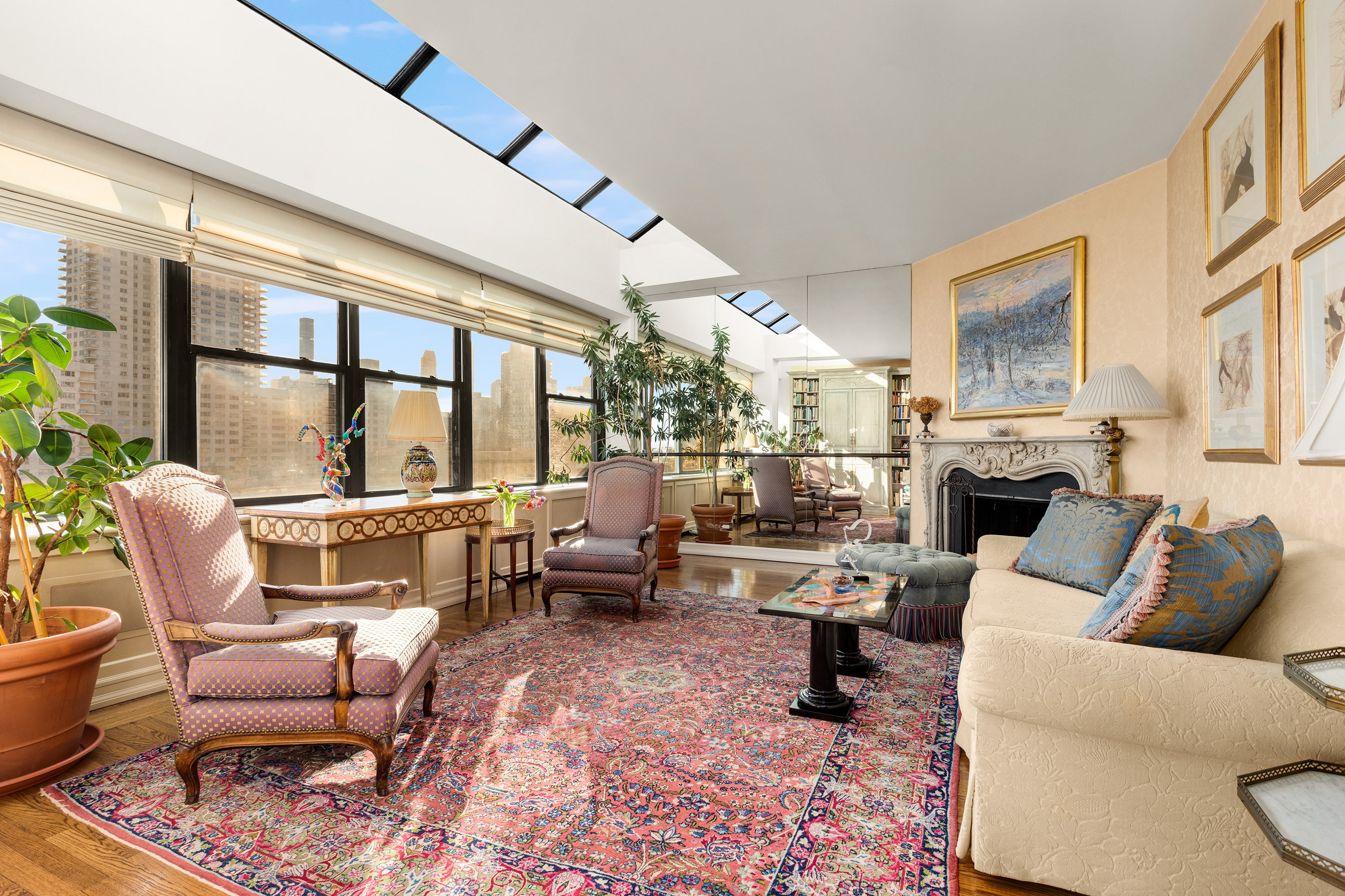 2 East End Avenue, Unit PHG Manhattan, NY 10075 - Photo 3 of 15 a living room with furniture fireplace and a large window
