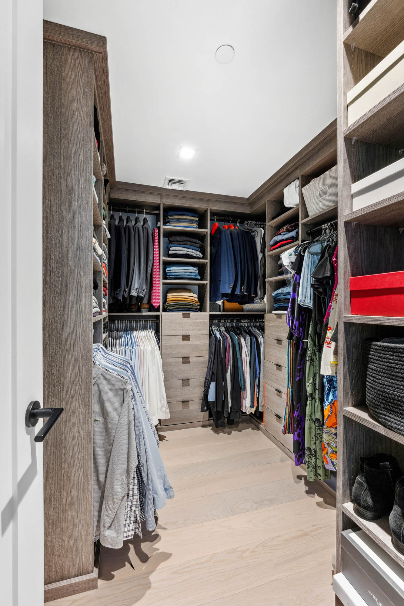 55 West 17th Street, Unit 701 Manhattan, NY 10011 - Photo 7 of 20 a view of walk in closet with clothes