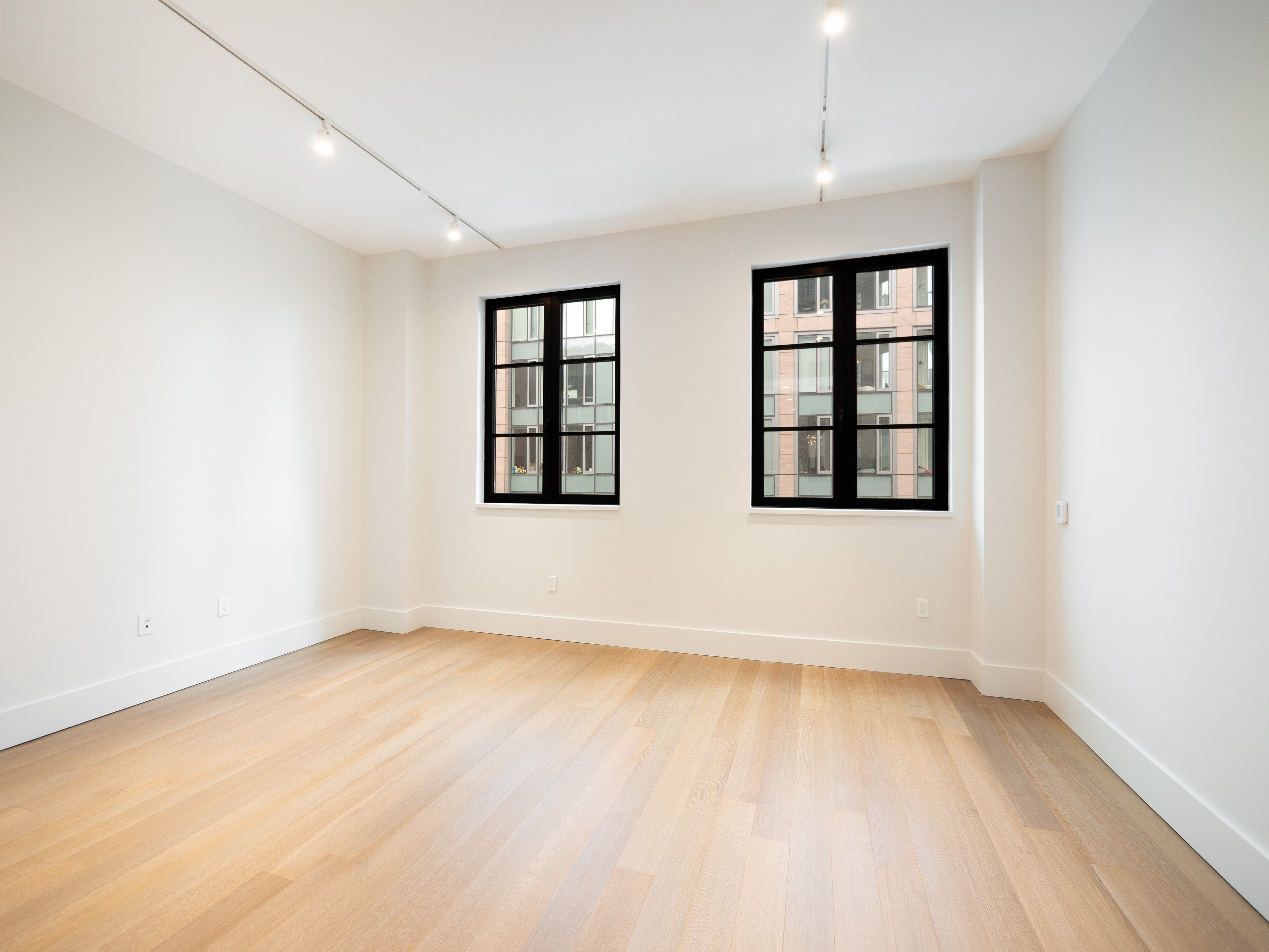 an empty room with windows