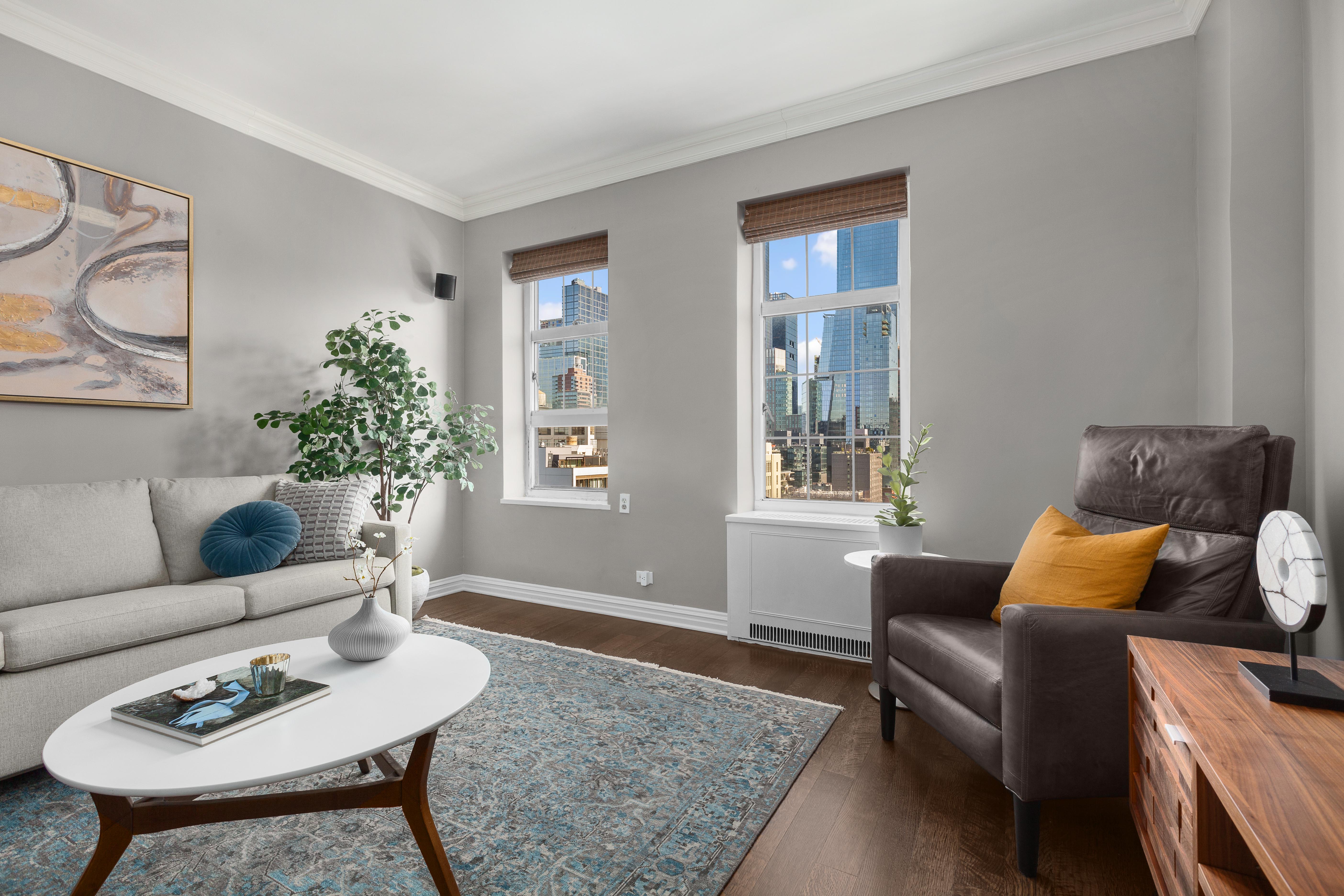 470 West 24th Street, Unit 16H Manhattan, NY 10011 - Photo 3 of 13 a living room with furniture and window