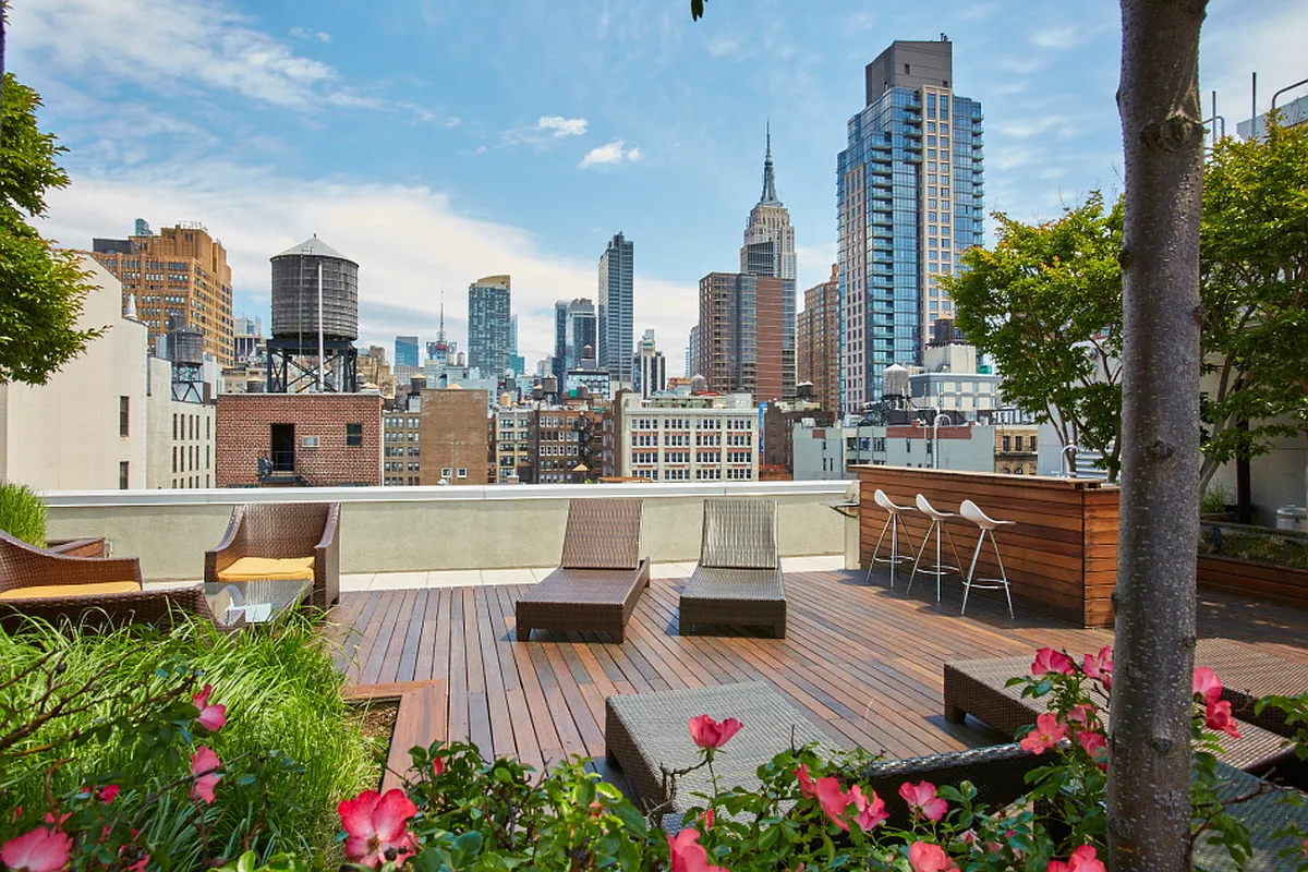 133 West 22nd Street, Unit 6A Manhattan, NY 10011 - Photo 7 of 9 a view of a city with tall buildings