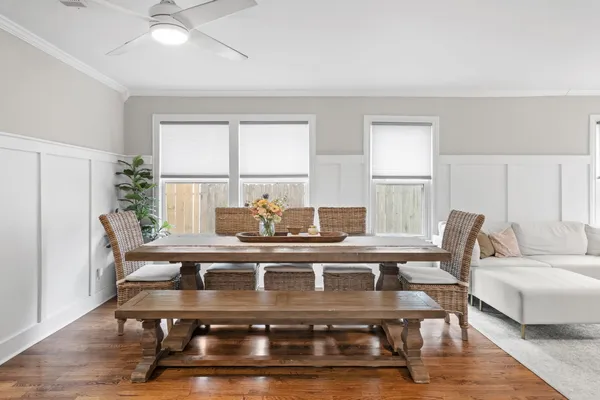 a living room with furniture and a table