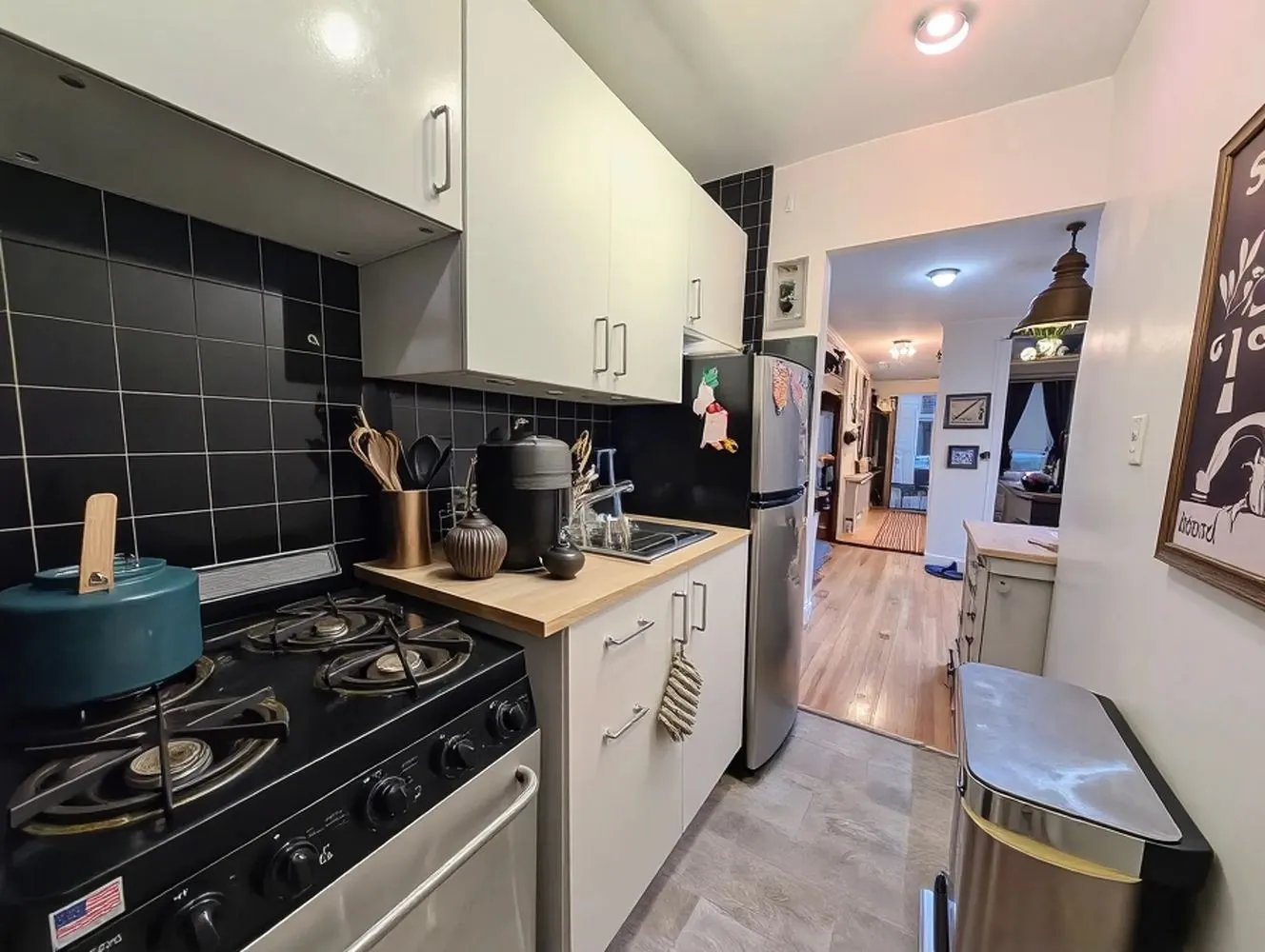 a kitchen with a stove and cabinets
