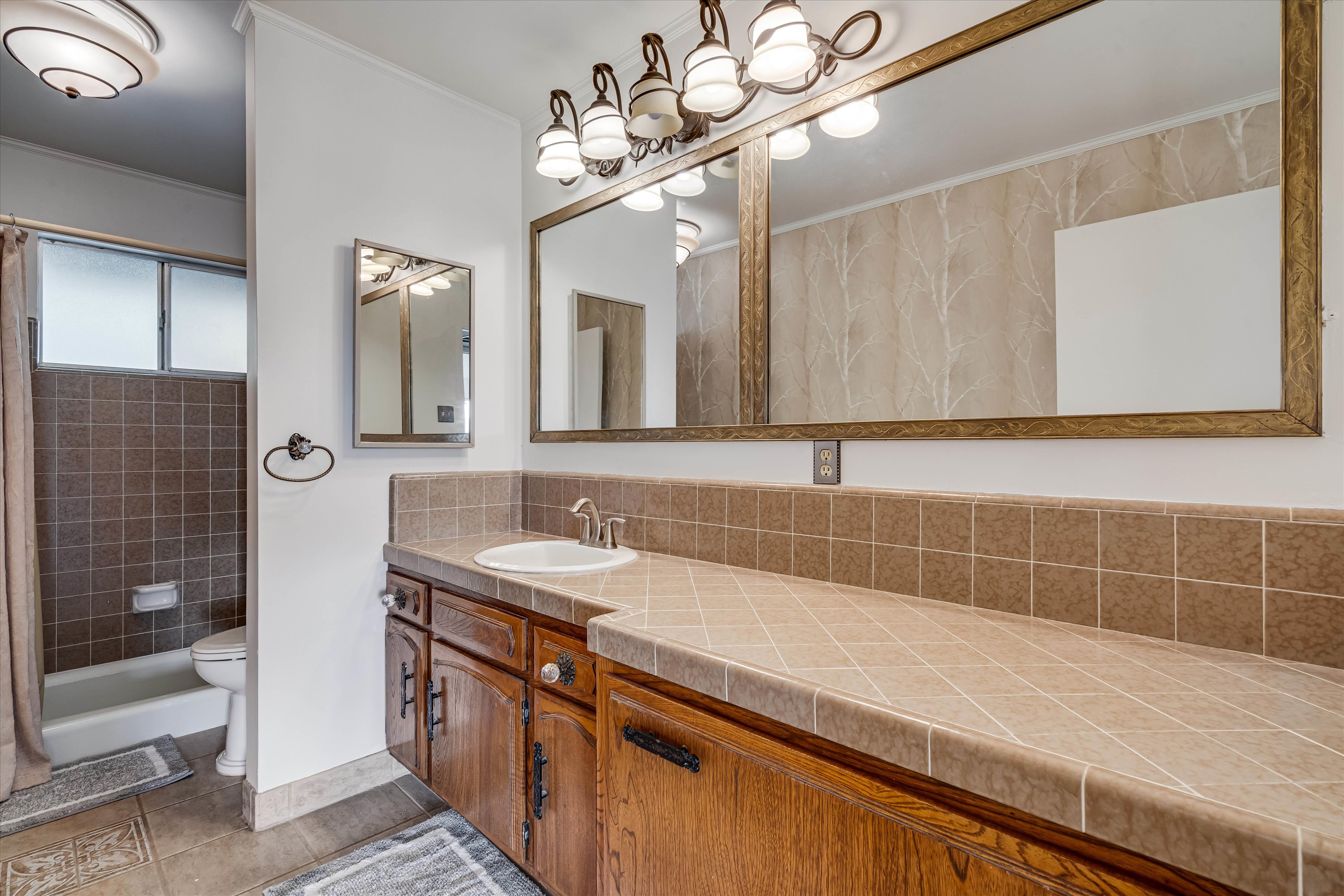 1291 Rockland Drive St. Helena, CA 94574 - Photo 10 of 26 a bathroom with a sink a vanity and a mirror